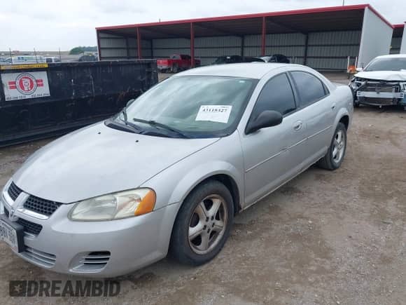 2006 Dodge Stratus SXT with VIN 1B3EL46X06N133671, listed as a IAAI auction lot 43118427 with 215,024 mi miles and . Bid and sale history available at DreamBid. Image 2.