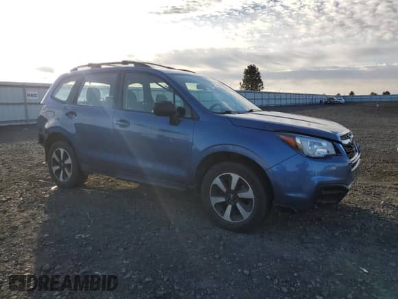 2017 Subaru Forester with VIN JF2SJABC6HH561546, listed as a Copart auction lot 82573365 with 102,075 mi miles and Salvage title. Bid and sale history available at DreamBid. Image 4.