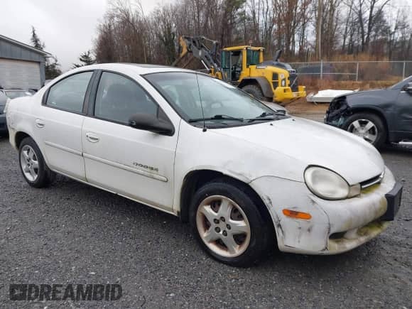 2000 Dodge Neon Highline z VIN 1B3ES46C5YD873452, wystawiony jako IAAI lot #41513250 z przebiegiem 187 868 mil mil oraz . Historia ofert i sprzedaży dostępna na DreamBid. Obrazek 6.