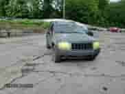 2004 Jeep Grand Cherokee Laredo z VIN 1J4GW48S74C226951, wystawiony jako Copart lot #67917385 z przebiegiem 231 849 mil mil oraz Szkoda całkowita • Salvage title. Historia ofert i sprzedaży dostępna na DreamBid. Obrazek 14.