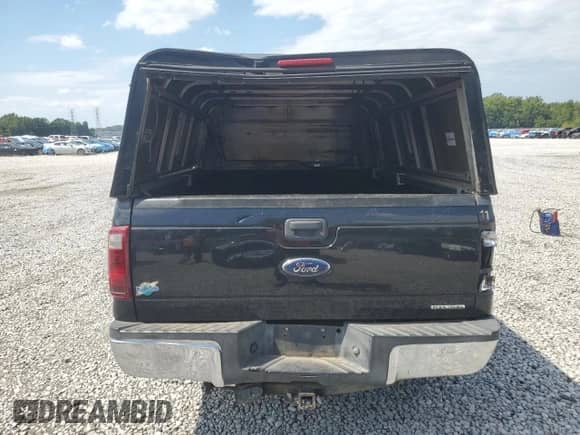 2013 Ford F-250 XL z VIN 1FT7X2A67DEA31361, wystawiony jako Copart lot #65064215 z przebiegiem 242 508 mil mil oraz Szkoda całkowita • Salvage title. Historia ofert i sprzedaży dostępna na DreamBid. Obrazek 6.