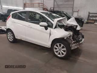 2012 Ford Fiesta SE with VIN 3FADP4EJ8CM180163, listed as a IAAI auction lot 42853102 with Not provided miles and . Bid and sale history available at DreamBid. Image 1.