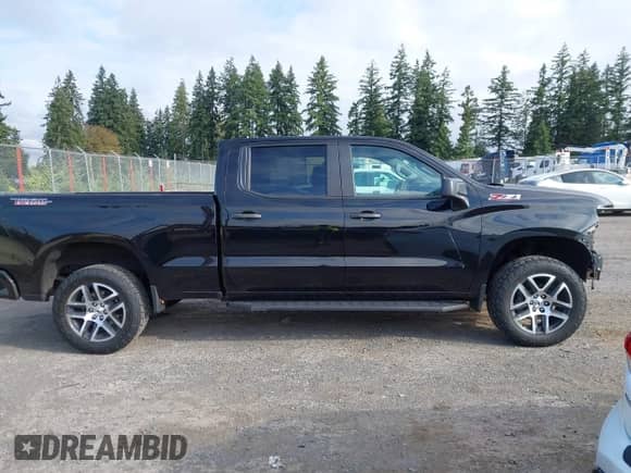 2020 Chevrolet Silverado 1500 Custom Trail Boss z VIN 1GCPYCEF5LZ368941, wystawiony jako IAAI lot #43214611 z przebiegiem 73 653 mil mil oraz . Historia ofert i sprzedaży dostępna na DreamBid. Obrazek 14.