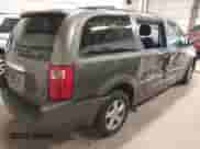 2010 Dodge Grand Caravan SXT with VIN 2D4RN5D14AR416488, listed as a IAAI auction lot 38412602 with 136,997 mi miles and . Bid and sale history available at DreamBid. Image 4.