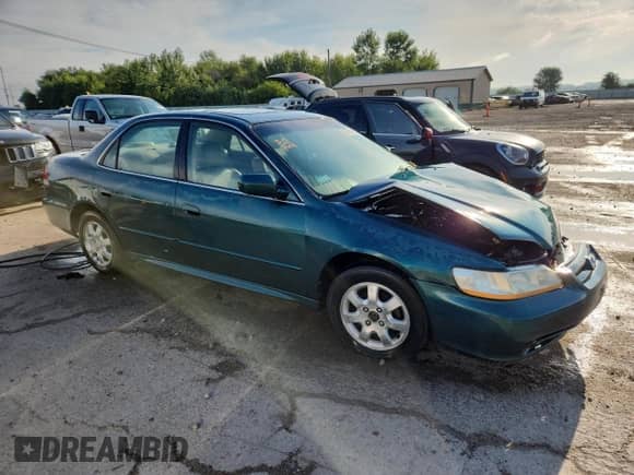 2002 Honda Accord EX с VIN 1HGCG56672A069817, выставлен на аукционе Copart как лот 69460205 с пробегом Не указан миль и Списание • Salvage title. История ставок и продаж доступна на DreamBid. Изображение 4.