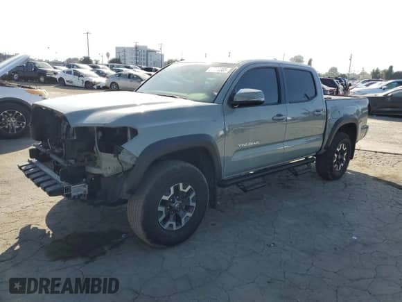 2022 Toyota Tacoma TRD Off Road с VIN 3TMCZ5AN6NM494685, выставлен на аукционе Copart как лот 82319385 с пробегом 42 267 миль миль и Списание • Salvage title. История ставок и продаж доступна на DreamBid. Изображение 1.