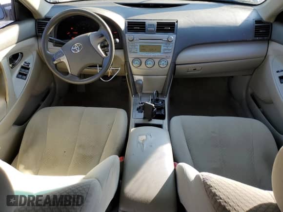 2007 Toyota Camry XLE z VIN 4T1BE46K27U029542, wystawiony jako Copart lot #71524365 z przebiegiem 185 774 mil mil oraz Szkoda całkowita • Salvage title. Historia ofert i sprzedaży dostępna na DreamBid. Obrazek 8.