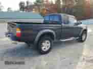 2001 Toyota Tacoma with VIN 5TEWN72N81Z873896, listed as a Copart auction lot 82741565 with 186,530 mi miles and Clean title. Bid and sale history available at DreamBid. Image 3.