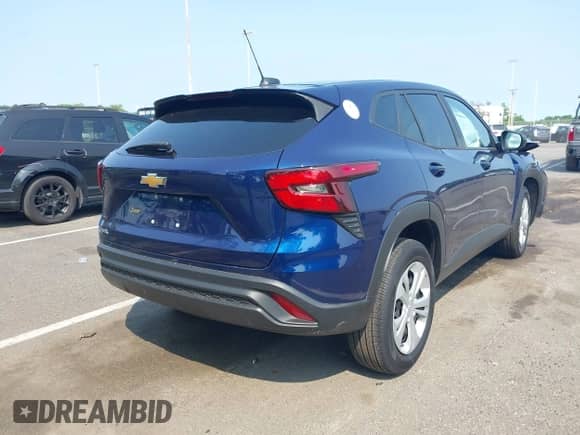 2024 Chevrolet Trax LS with VIN KL77LFE22RC154463, listed as a IAAI auction lot 42395532 with 13,645 mi miles and . Bid and sale history available at DreamBid. Image 4.