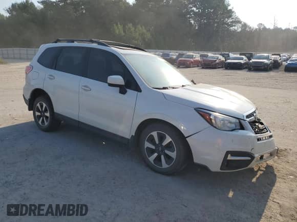 2018 Subaru Forester Premium with VIN JF2SJAGC1JH513693, listed as a Copart auction lot 80867195 with 196,606 mi miles and Salvage title. Bid and sale history available at DreamBid. Image 4.