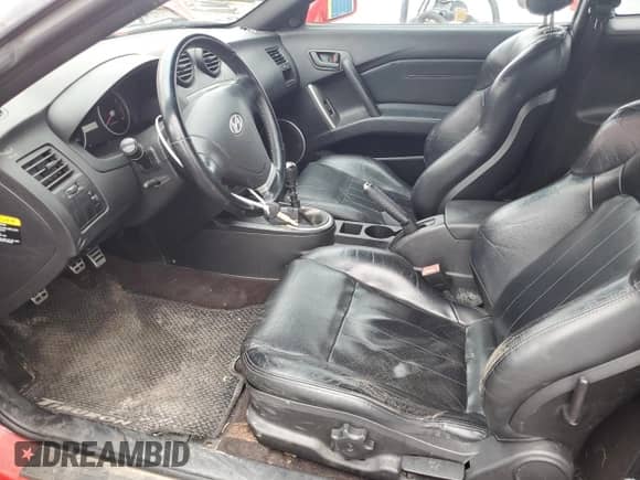 2004 Hyundai Tiburon GT с VIN KMHHN65F24U142204, выставлен на аукционе Copart как лот 50347055 с пробегом 128 040 миль миль и Чистый • Clean title. История ставок и продаж доступна на DreamBid. Изображение 7.