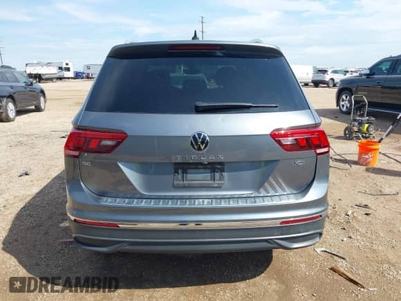 2023 Volkswagen Tiguan SE with VIN 3VVNB7AX7PM058281, listed as a IAAI auction lot 42748892 with 53,572 mi miles and . Bid and sale history available at DreamBid. Image 16.