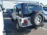 2002 Jeep Wrangler X z VIN 1J4FA39S32P776088, wystawiony jako IAAI lot #43183058 z przebiegiem 80 642 mil mil oraz . Historia ofert i sprzedaży dostępna na DreamBid. Obrazek 3.