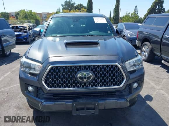 2019 Toyota Tacoma SR5 с VIN 3TMAZ5CN3KM084409, выставлен на аукционе IAAI как лот 43076335 с пробегом 73 078 миль миль и . История ставок и продаж доступна на DreamBid. Изображение 13.