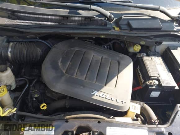 2012 Dodge Grand Caravan American Value с VIN 2C4RDGBG5CR203409, выставлен на аукционе IAAI как лот 43214898 с пробегом 215 617 миль миль и . История ставок и продаж доступна на DreamBid. Изображение 10.