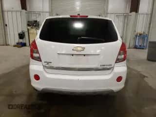 2014 Chevrolet Captiva Sport LT with VIN 3GNAL3EK4ES661268, listed as a Copart auction lot 74895224 with 128,513 mi miles and Salvage title. Bid and sale history available at DreamBid. Image 6.