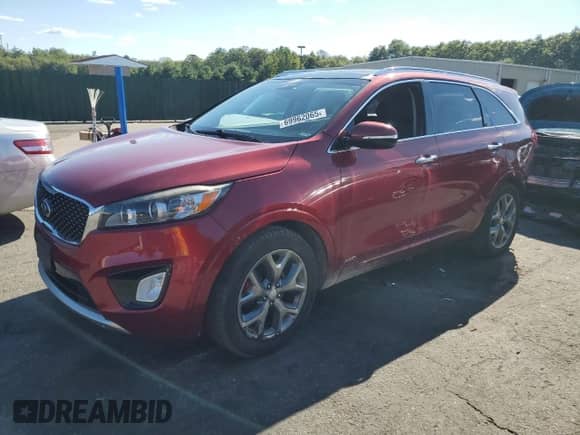 2016 Kia Sorento SXL z VIN 5XYPKDA57GG081853, wystawiony jako Copart lot #69962065 z przebiegiem 109 996 mil mil oraz Szkoda całkowita • Salvage title. Historia ofert i sprzedaży dostępna na DreamBid. Obrazek 1.