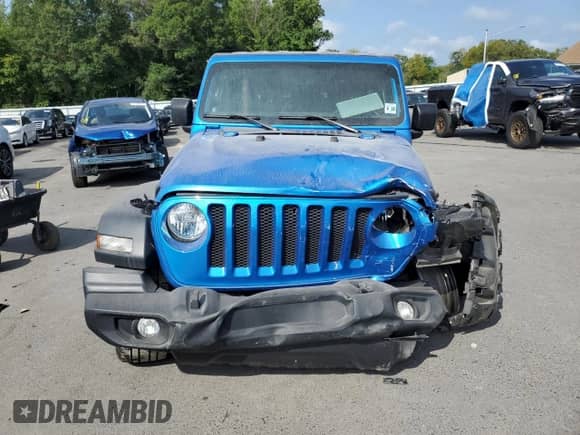 2023 Jeep Wrangler Sport S with VIN 1C4HJXDG7PW677814, listed as a Copart auction lot 67802085 with 28,546 mi miles and Salvage title. Bid and sale history available at DreamBid. Image 5.