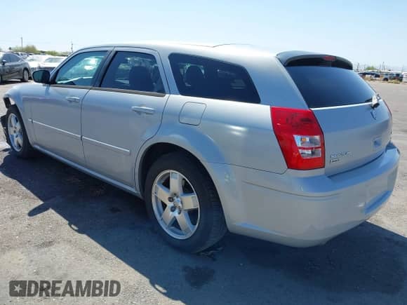 2005 Dodge Magnum with VIN 2D8GZ58235H576127, listed as a IAAI auction lot 41989680 with 136,488 mi miles and . Bid and sale history available at DreamBid. Image 3.