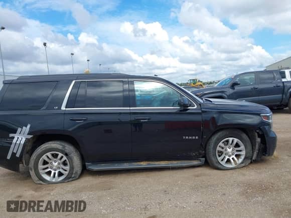 2017 Chevrolet Tahoe LT with VIN 1GNSCBKC0HR122195, listed as a IAAI auction lot 40189425 with Not provided miles and . Bid and sale history available at DreamBid. Image 13.