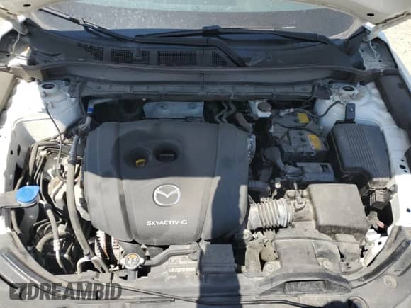 2022 Mazda CX-5 S Select z VIN JM3KFBBM5N0588494, wystawiony jako Copart lot #58202465 z przebiegiem 91 794 mil mil oraz Szkoda całkowita • Salvage title. Historia ofert i sprzedaży dostępna na DreamBid. Obrazek 11.