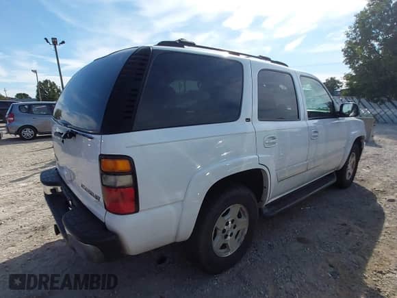 2005 Chevrolet Tahoe LT with VIN 1GNEK13T45J219936, listed as a IAAI auction lot 43189476 with 213,964 mi miles and . Bid and sale history available at DreamBid. Image 4.