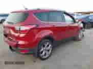 2017 Ford Escape Titanium with VIN 1FMCU0J97HUB23535, listed as a IAAI auction lot 43246540 with 97,026 mi miles and . Bid and sale history available at DreamBid. Image 4.