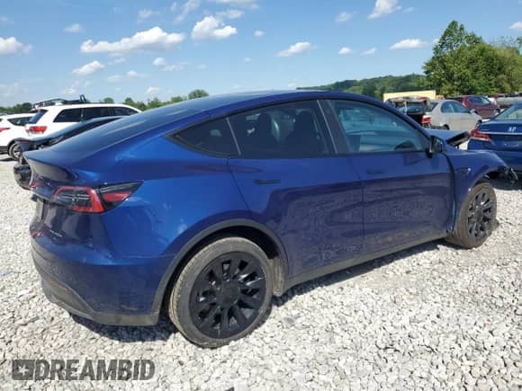 2023 Tesla Model Y Long Range with VIN 7SAYGDEEXPF749820, listed as a Copart auction lot 58756274 with 11,207 mi miles and Salvage title. Bid and sale history available at DreamBid. Image 3.