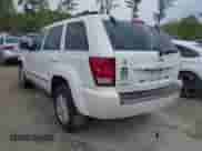 2009 Jeep Grand Cherokee with VIN 1J8GS58K49C532805, listed as a IAAI auction lot 42001527 with 104,979 mi miles and . Bid and sale history available at DreamBid. Image 3.