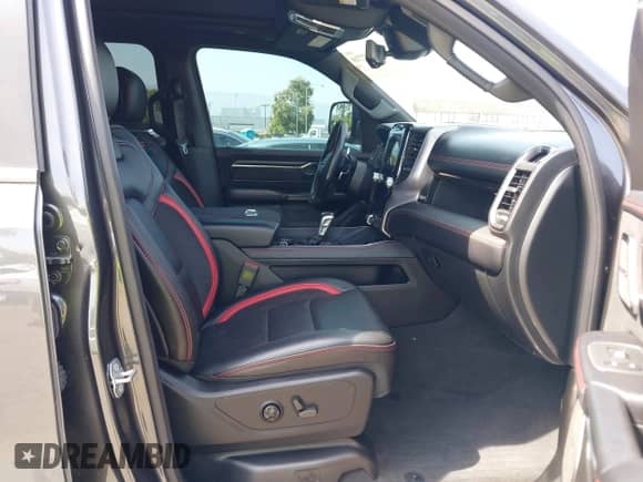 2022 Ram 1500 TRX with VIN 1C6SRFU91NN392885, listed as a IAAI auction lot 42482710 with 13,090 mi miles and . Bid and sale history available at DreamBid. Image 5.