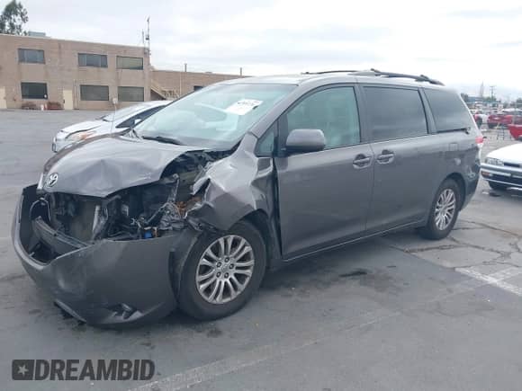 2012 Toyota Sienna XLE AAS with VIN 5TDYK3DC3CS185326, listed as a IAAI auction lot 42576736 with 189,134 mi miles and . Bid and sale history available at DreamBid. Image 2.