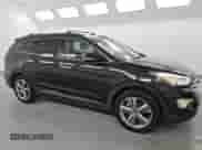 2013 Hyundai Santa Fe Limited with VIN KM8SRDHF8DU003110, listed as a Copart auction lot 71061695 with 146,518 mi miles and Clean title. Bid and sale history available at DreamBid. Image 4.