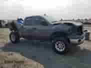2004 Dodge 1500 SLT z VIN 1D7HU18D54J202861, wystawiony jako Copart lot #69565065 z przebiegiem 184 018 mil mil oraz Szkoda całkowita • Salvage title. Historia ofert i sprzedaży dostępna na DreamBid. Obrazek 4.
