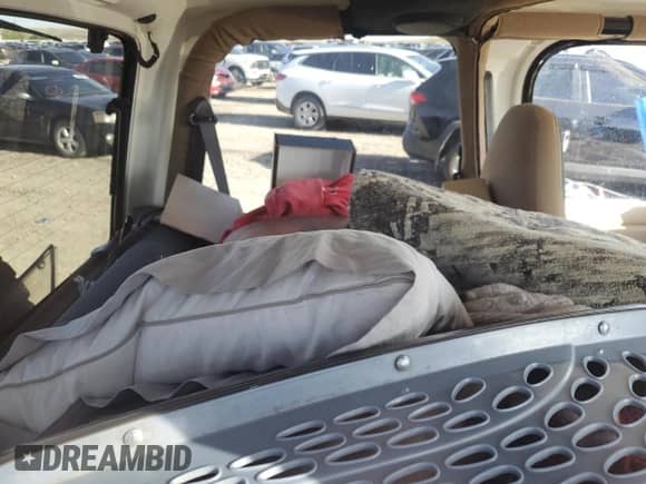 1999 Jeep Wrangler Sahara z VIN 1J4FY49S9XP479545, wystawiony jako Copart lot #54753745 z przebiegiem 34 642 mil mil oraz Szkoda całkowita • Salvage title. Historia ofert i sprzedaży dostępna na DreamBid. Obrazek 10.