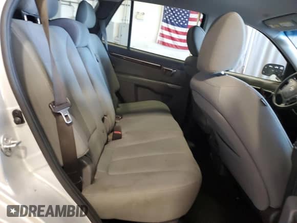 2012 Hyundai Santa Fe GLS z VIN 5XYZG3AB1CG113698, wystawiony jako Copart lot #71229884 z przebiegiem 252 820 mil mil oraz Szkoda całkowita • Salvage title. Historia ofert i sprzedaży dostępna na DreamBid. Obrazek 11.