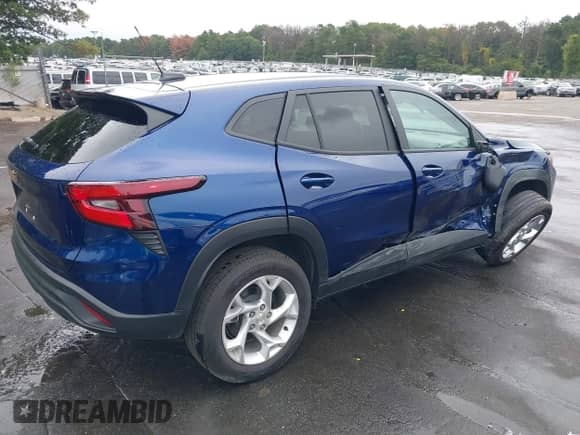 2024 Chevrolet Trax LS with VIN KL77LFE22RC152857, listed as a IAAI auction lot 43244346 with 9,652 mi miles and . Bid and sale history available at DreamBid. Image 4.