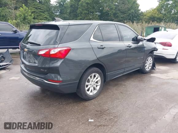 2018 Chevrolet Equinox LT with VIN 2GNAXSEV5J6344052, listed as a IAAI auction lot 43291150 with 77,204 mi miles and . Bid and sale history available at DreamBid. Image 4.