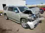 2015 Chevrolet Suburban LTZ z VIN 1GNSKKKC8FR245890, wystawiony jako Copart lot #80150495 z przebiegiem 216 132 mil mil oraz Czysty tytuł • Clean title. Historia ofert i sprzedaży dostępna na DreamBid. Obrazek 4.