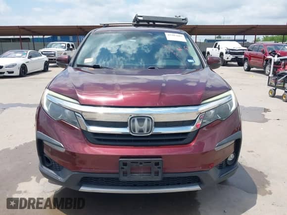 2020 Honda Pilot EX с VIN 5FNYF6H3XLB019034, выставлен на аукционе IAAI как лот 42207607 с пробегом 150 511 миль миль и . История ставок и продаж доступна на DreamBid. Изображение 12.