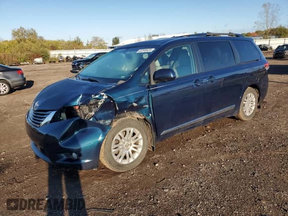 2012 Toyota Sienna XLE with VIN 5TDYK3DC5CS245235, listed as a Copart auction lot 82349425 with 149,275 mi miles and Salvage title. Bid and sale history available at DreamBid. Image 1.