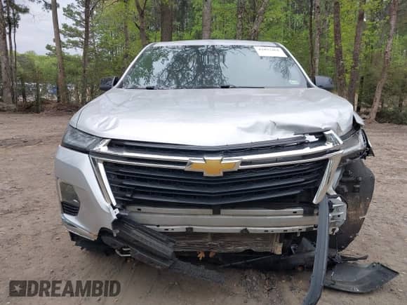 2022 Chevrolet Traverse LS z VIN 1GNEVFKW4NJ101305, wystawiony jako IAAI lot #42037461 z przebiegiem 62 055 mil mil oraz . Historia ofert i sprzedaży dostępna na DreamBid. Obrazek 6.