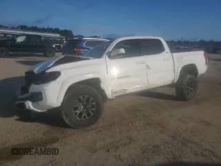 2021 Toyota Tacoma SR с VIN 5TFAX5GN8MX194384, выставлен на аукционе Copart как лот 68490735 с пробегом 84 169 миль миль и Списание • Salvage title. История ставок и продаж доступна на DreamBid. Изображение 1.