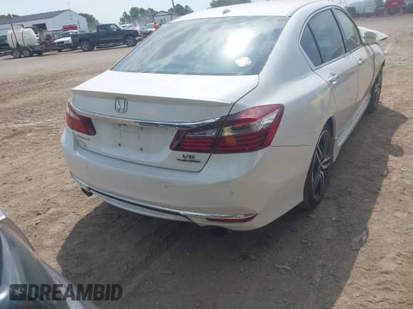 2017 Honda Accord Touring with VIN 1HGCR3F92HA010806, listed as a IAAI auction lot 43204203 with Not provided miles and . Bid and sale history available at DreamBid. Image 4.