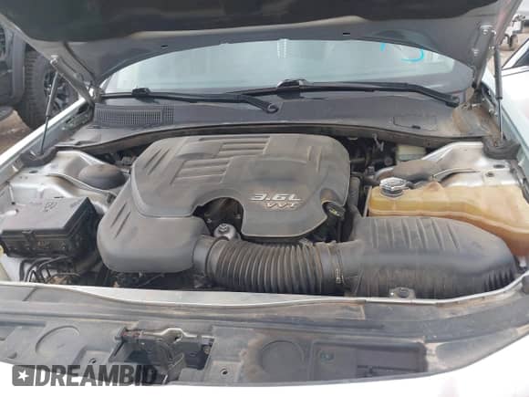 2013 Chrysler 300 with VIN 2C3CCAAGXDH707697, listed as a IAAI auction lot 42315349 with Not provided miles and . Bid and sale history available at DreamBid. Image 10.