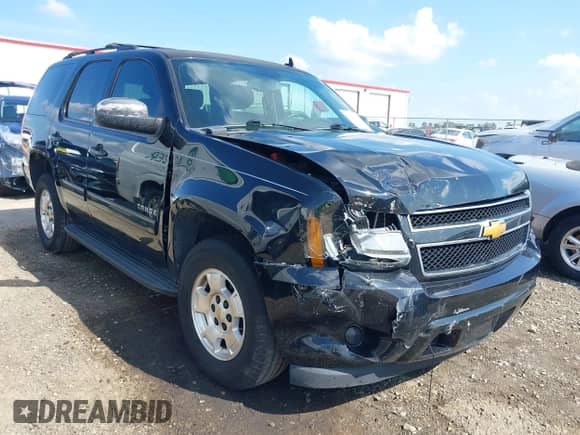 2013 Chevrolet Tahoe LS with VIN 1GNSCAE05DR177005, listed as a IAAI auction lot 42822911 with 121,243 mi miles and . Bid and sale history available at DreamBid. Image 1.