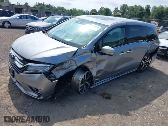 2018 Honda Odyssey Elite z VIN 5FNRL6H99JB070314, wystawiony jako IAAI lot #42708078 z przebiegiem Nie podano mil oraz . Historia ofert i sprzedaży dostępna na DreamBid. Obrazek 17.