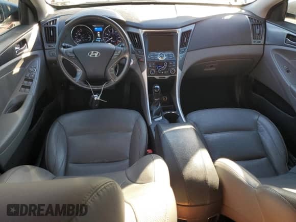 2013 Hyundai Sonata with VIN KMHEC4A46DA101674, listed as a Copart auction lot 87481035 with 185,060 mi miles and Clean title. Bid and sale history available at DreamBid. Image 8.