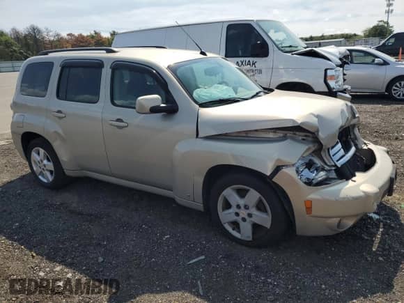 2009 Chevrolet HHR 1LT with VIN 3GNCA23V99S558455, listed as a Copart auction lot 70630975 with 99,566 mi miles and Salvage title. Bid and sale history available at DreamBid. Image 4.