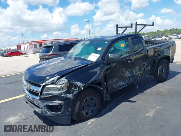 2019 Chevrolet Colorado 2WD Work Truck with VIN 1GCHSBEA7K1241528, listed as a IAAI auction lot 42530288 with 99,798 mi miles and . Bid and sale history available at DreamBid. Image 17.