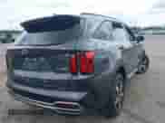 2021 Kia Sorento EX with VIN 5XYRH4LF4MG032974, listed as a IAAI auction lot 42235158 with 74,850 mi miles and . Bid and sale history available at DreamBid. Image 4.